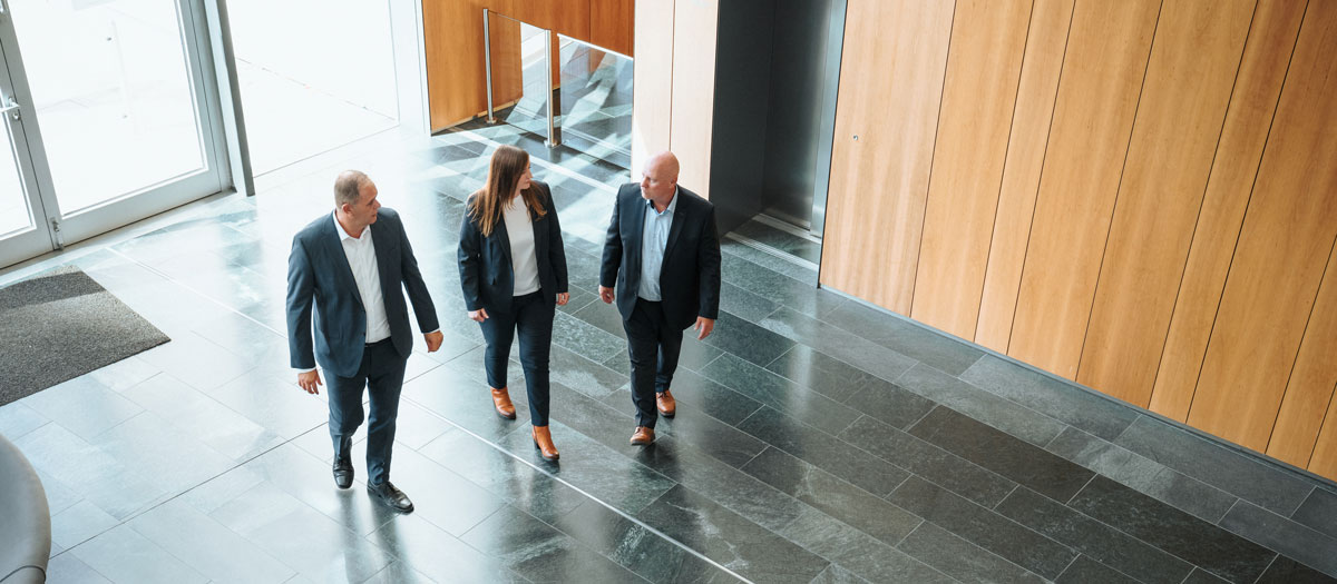 Team der Gruppen-Unfallversicherung im Foyer